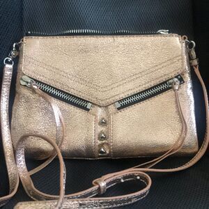 Botkier rose gold metallic trigger clutch crossbody with studs